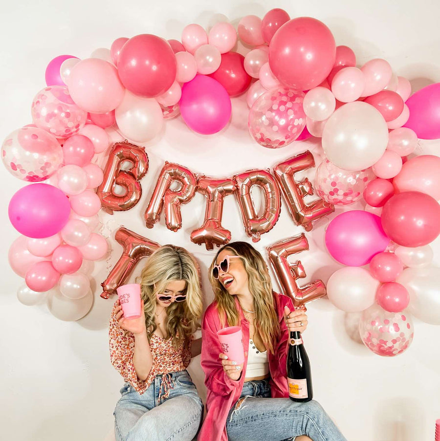 Pink DIY Bachelorette Party Balloon Garland | Bride's Babes Bachelorette Party Decorations, Favors, Accessories